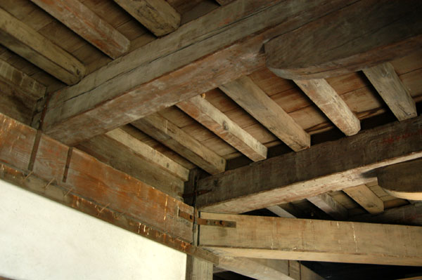 The Donjon is built of wood covered with fireproof white plaster on the exterior