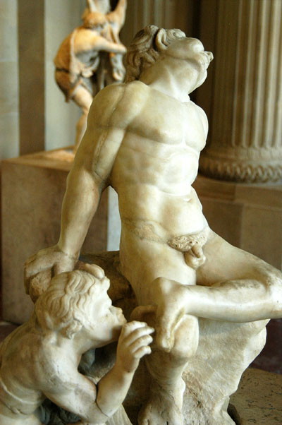 Pan removing a thorn from the foot of a Satyr