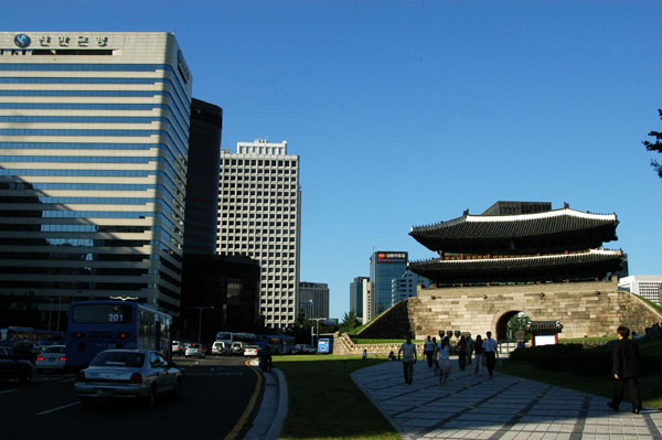 Namdaemun Gate surrounded now by tall buildings