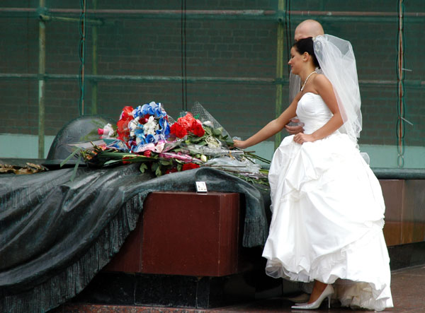 It is a tradition for newlywed Russian couples to lay flowers at the Tomb of the Unknown Soldier