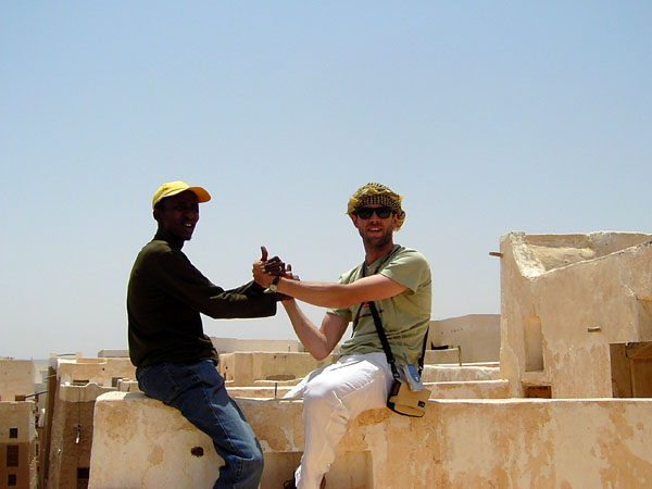 Solomon with Mouro up onn Shibam hadramout building
