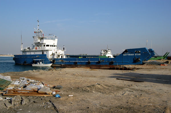 Landing craft style ferry on the beach near Abu Dhabi Mall