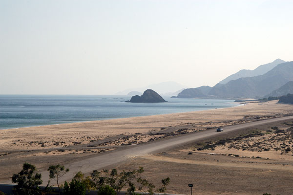 View looking south from Al Aqah with Snoopy Island (Jazirat Al Ghubbah)