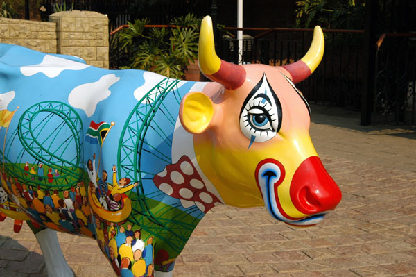 Colorful cow greeting visitors to Gold Reef City