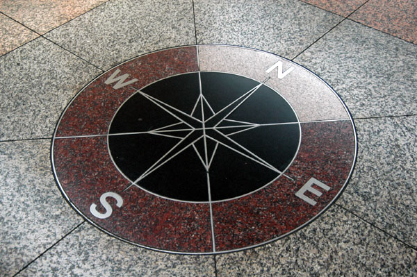 Look down on the pavement for an orientation compass rose