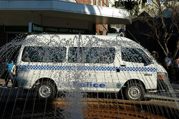 Australian police van and fountain