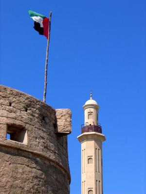 Tower, UAE flag and minaret