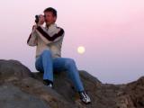 Ralph filming sunset on the cliffs at Lderitz with the moon rising