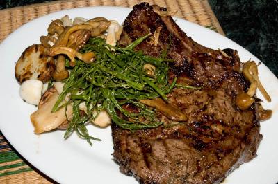 charcoal grilled ribeye steak, sauteed wild mushrooms, sauteed sea beans