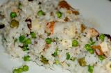 rice salad with shrimp, cornichons, tuna, cheese and peas