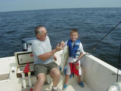 Billy Ramsey age 7 with first legal Rock fish. Caught on live spot at Podickery Point. 9/18/05