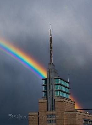 Rainbow over city