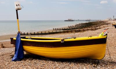 Yellow boat at Worthing, Sussex
