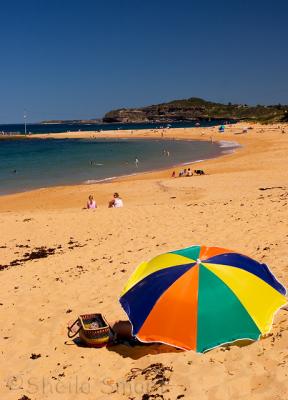 Mona Vale Beach with umbrella