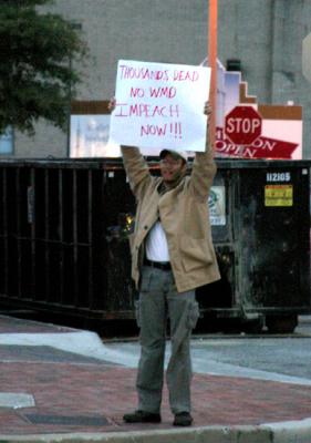 lone, early morning protester(Iraq War veteran)