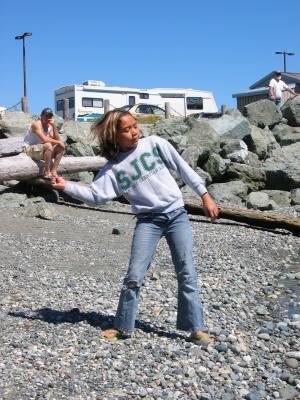 Rachel skipping stones at Kingston ferry terminal