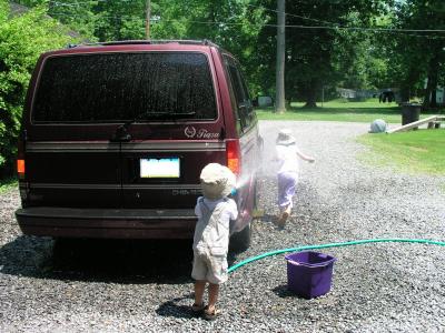 Kyle and Sarah washing the van
