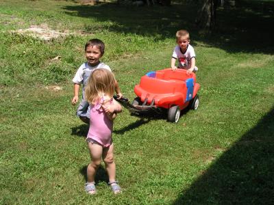 The kids playing at the birthday party