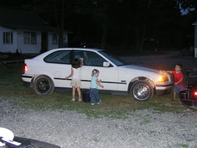 The kids washing Chad's car