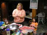 Michelle and Sarah making burgers