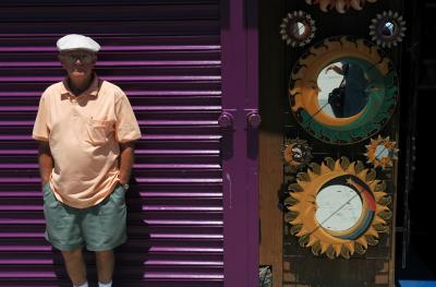 Old man standing on the boardwalk in Venice Beach