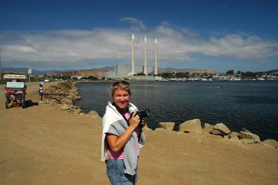 Laurie pauses from shooting pictures at Morro Bay.