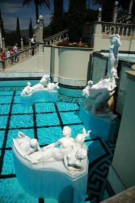 Statues over outdoor pool