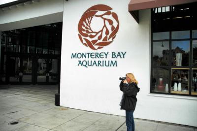 Laurie in front of the Monterey Bay Aquarium