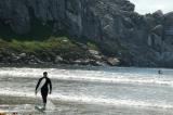 Surfer at Morro Bay State Beach.