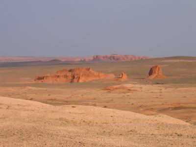 The distant red cliffs