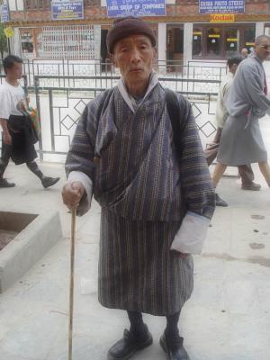 Thimphu, gentleman has a nice look at me, and vice versa , he is wearing the national dress, a gho, which is the legal required attire, perhaps, in part, because of the southern troubles not too many years before I visited
grandpa near traffic circle