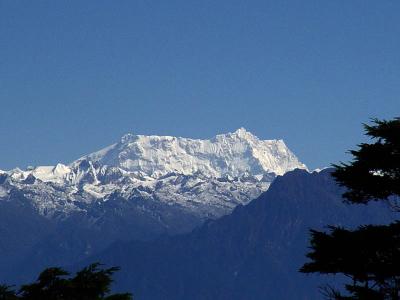 gangkar puensum, highest unclimbed mtn in world(read steve berry's book) 7000 meter +