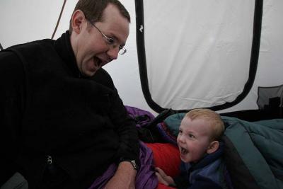 Ralph and Luis mucking around in tent