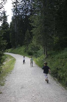 Ezekiel, Jemima and Luis running on track