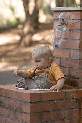 Oscar Sitting In Basin