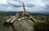 bm Tim Fills In Logbook On Mt Kelly.jpg