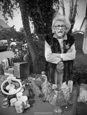 Woman at the annual national garage sale on Queensday in Amstelveen, The Netherlands